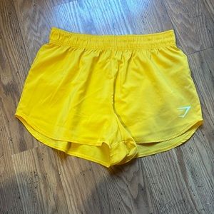 Yellow Gymshark shorts
